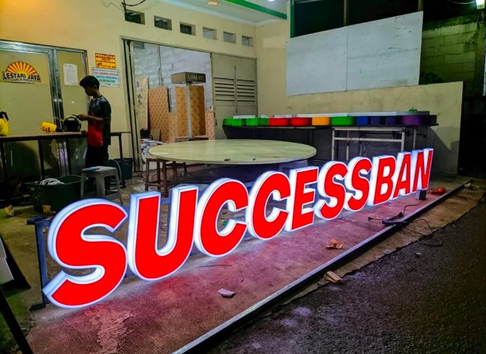 Large red 3D LED glow sign board letters made at the workshop